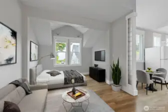 Open living and bedroom area in ADU. Photo Virtually Staged