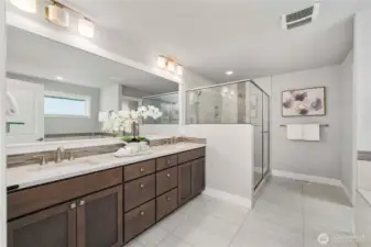 Spa-inspired primary suite with luxury 5-piece bath
