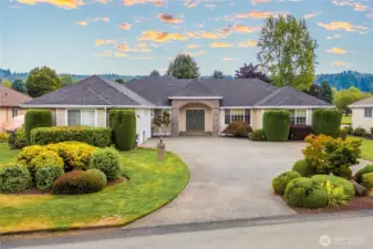 Stately Presence to this 2500 sq ft one level home located on High Cedars Golf Course.