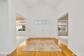Formal Entry with hardwood floors and Marble inset.