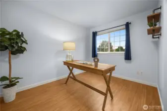 Upper bedroom is being used as an office.