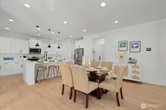 Perfectly Positioned Dining Space Between Kitchen and Living Room