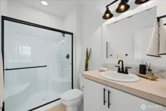 Contemporary downstairs Guest Bath with Oversized Shower and Matte Black Finishes