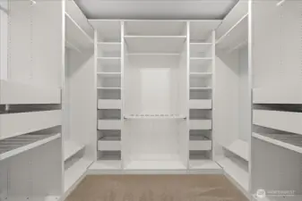 Spacious Closet in the Primary Bedroom with Built-In Custom Storage for Maximum Organization
