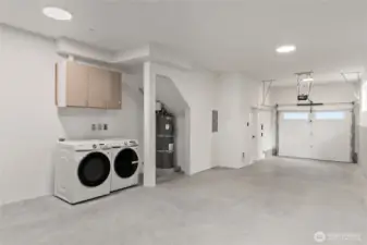 Utility room in spacious 2 car garage tandum