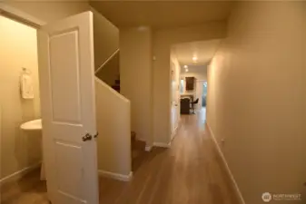 Entrance with half bath on main floor ~ walk in storage, like new floors & paint.