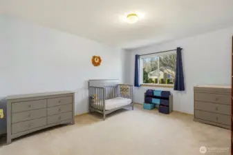 Large bedroom with generous closet space.