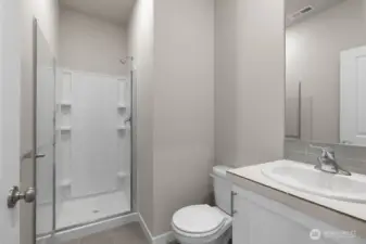 Main floor 3/4 bath.  Colors and finishes may vary.