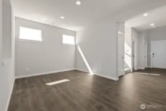 High set windows bring in lots of light and allow space for furniture.  Colors and finishes may vary.