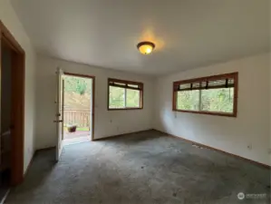 Main floor primary with private patio access