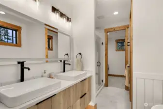 Primary bath with electric mirror.