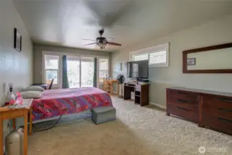 Covered rear deck is also accessed from the primary.