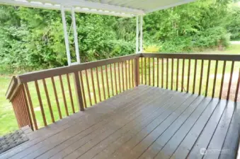 Covered deck in the back yard.