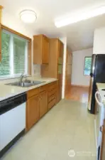Galley kitchen - appliances stay.