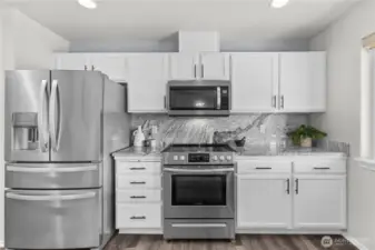 Kitchen with updated cabinets.