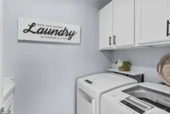 Laundry room washer and dryer included.