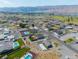 Aerial view side of home with RV parking.