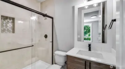 Private bathroom for one of the Upper Level bedrooms