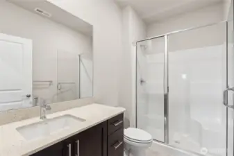 3/4 bath on main level will include white cabinetry.