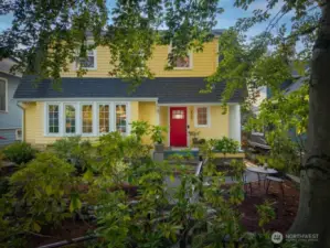 One feels like you are iiving in an elegant tree house with these beautiful evergreen trees framing the home. They have kept the character and integrity of the home intact with some gorgeous upgrades.