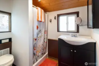 The ¾ bathroom is an excellent spot for prep and primping.