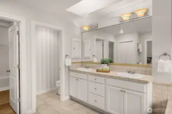 Primary bathroom with separate water closet. Make sure to walk into to the closet it is big and turns the corner with more space.