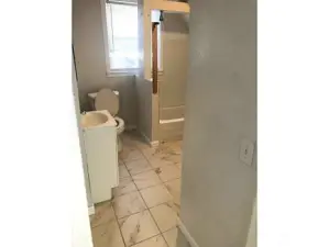 Unit One 1b1b - bathroom with private laundry