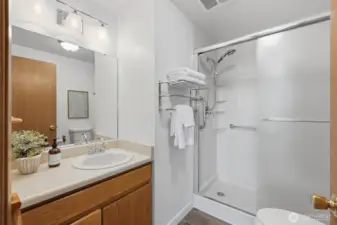 3/4 Bathroom off the hallway with NEW shower and toilet.