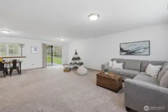 Large rec room, additional bedroom and bath, plus slider to the patio and expansive backyard — perfect for guests, hobbies, or multi-generational living.