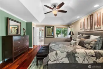 This spacious primary bedroom is also paired with it's on walk-in closet and en-suite bathroom.