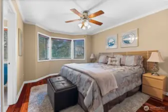 Third bedroom complimented with it's own gorgeous window nook and en-suite shared bathroom.