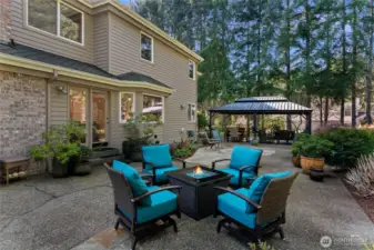 Escape into your own backyard retreat. Accessible through the primary bedroom and kitchen, this backyard allows for easy transitions for indoor to outdoor enjoyment!