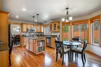 Light and bright, open kitchen, cherry floors, granite counters, access to formal dining room, breakfast nook and family room