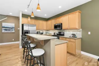 Maple cabinets w/tile backsplash