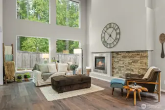 Living Room with Cozy Gas Fireplace, High Vaulted Ceilings and Large Picture Windows