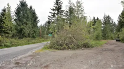 View of 1 acre triangle lot perfect for shop from the North point.