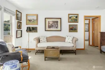 Living Room conveniently located next to the kitchen for added ease.