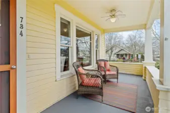 Covered veranda with tapered columns~