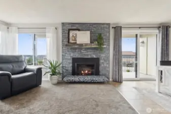 The cozy electric fireplace adds comfort and ambiance to your home