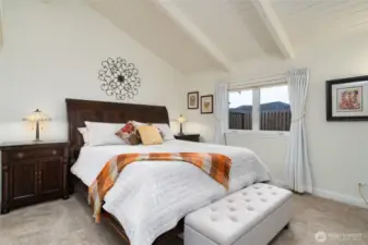 roomy main floor primary bedroom suite