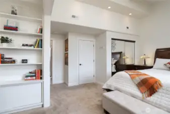 primary closets, one walk-in and one behind the mirror doors.  Bathroom to the left of the walk-in closet.