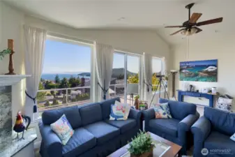 upstairs family room with beautiful views and deck for entertaining or just enjoying the sun.