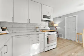 Kitchen offers storage.