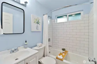 Modern fresh style full bath.