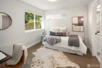 Lower level bedroom with en suite bath.