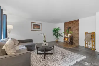 Family room with wood fireplace