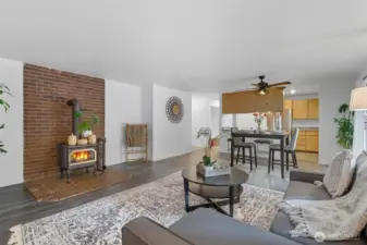 Open and perfect for entertaining! Complete with a wood stove for those cozy nights.