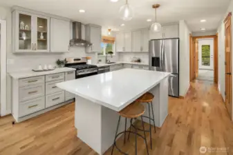 Bright and updated kitchen equipped with stainless steel appliances