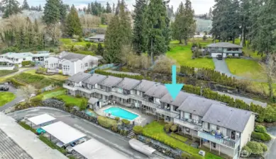 This unit is right next to the pool. On the main floor the sliding door opens to the pool just to the ight of the door with convenient access.