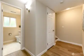 New flooring downstairs and in full bathroom. Storage under the stairway.